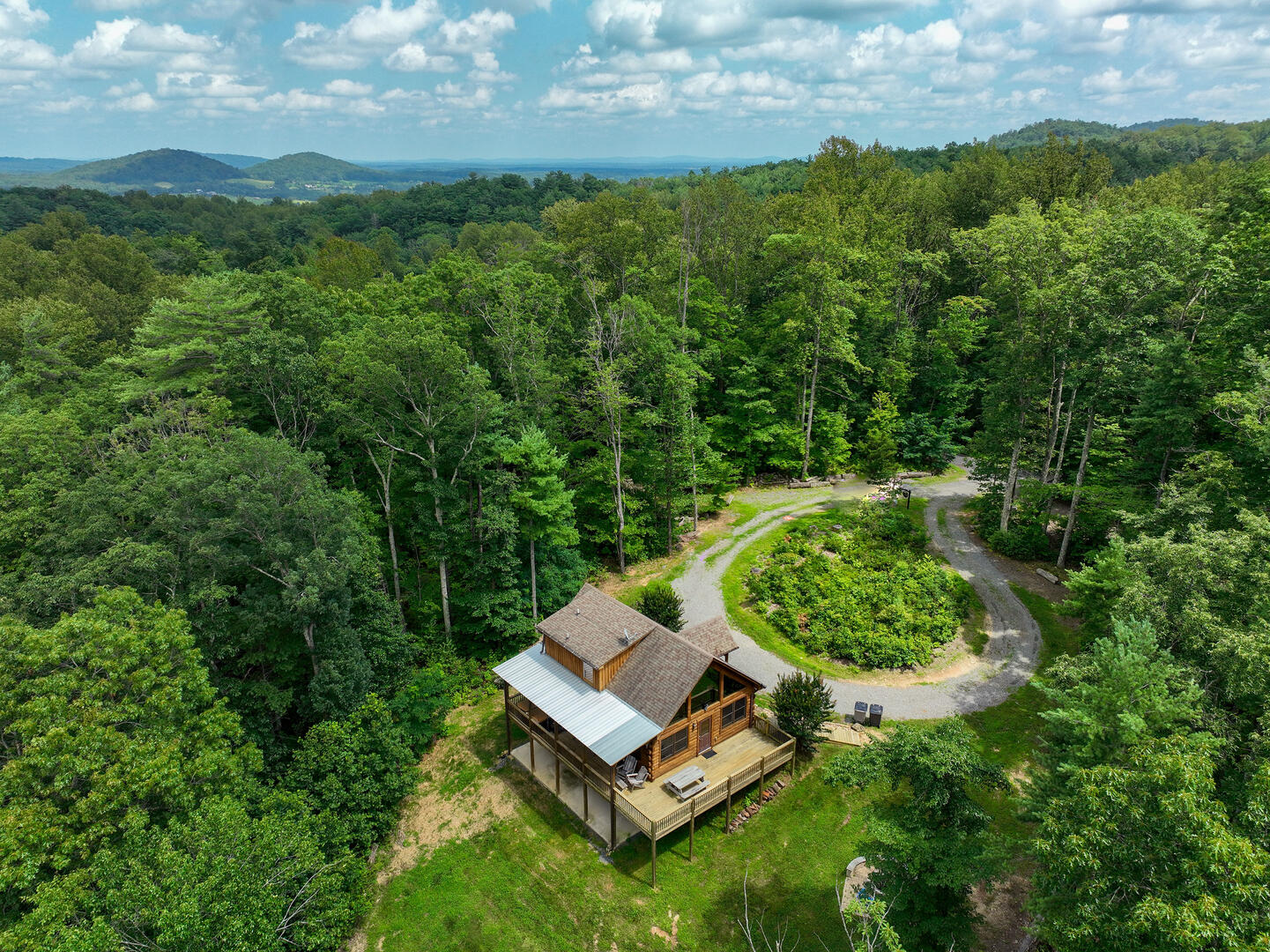 Snow-capped mountains reflected in a clear Alpine lake
